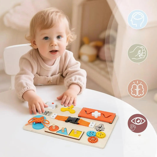 Busy board orange bebe joue seul