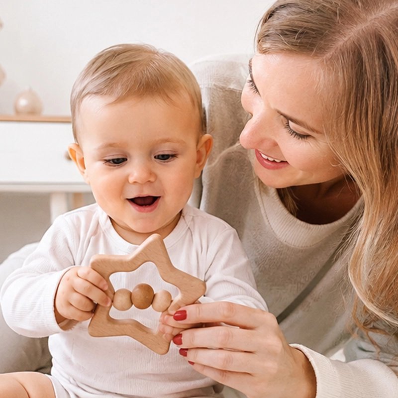 Jouet bebe etoile maman joue avec bebe