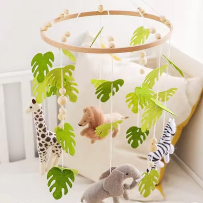 Mobile bébé jungle présentation avec berceau